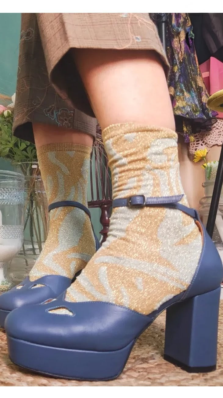 Scarpe Occhietti